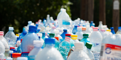 Many plastic bottles next to each other.