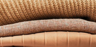 three similarly coloured fabrics