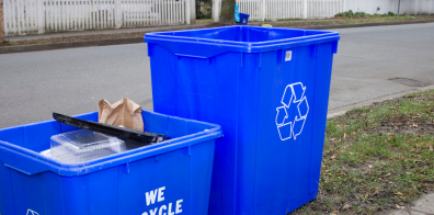 two different sized blue recycling boxes