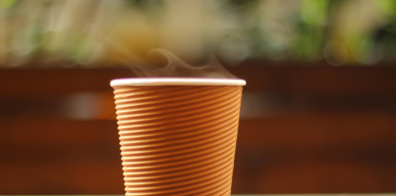 steam coming out of a reusable brown cup