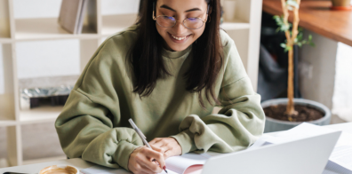 Women smiling with laptop