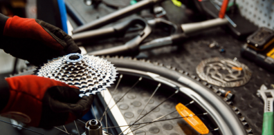 Person fixing a bike